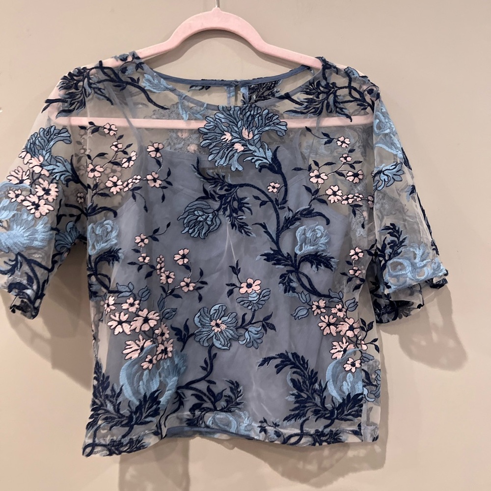 Romeo & Juliet Couture Sheer Blue Floral Blouse with blue tank under
